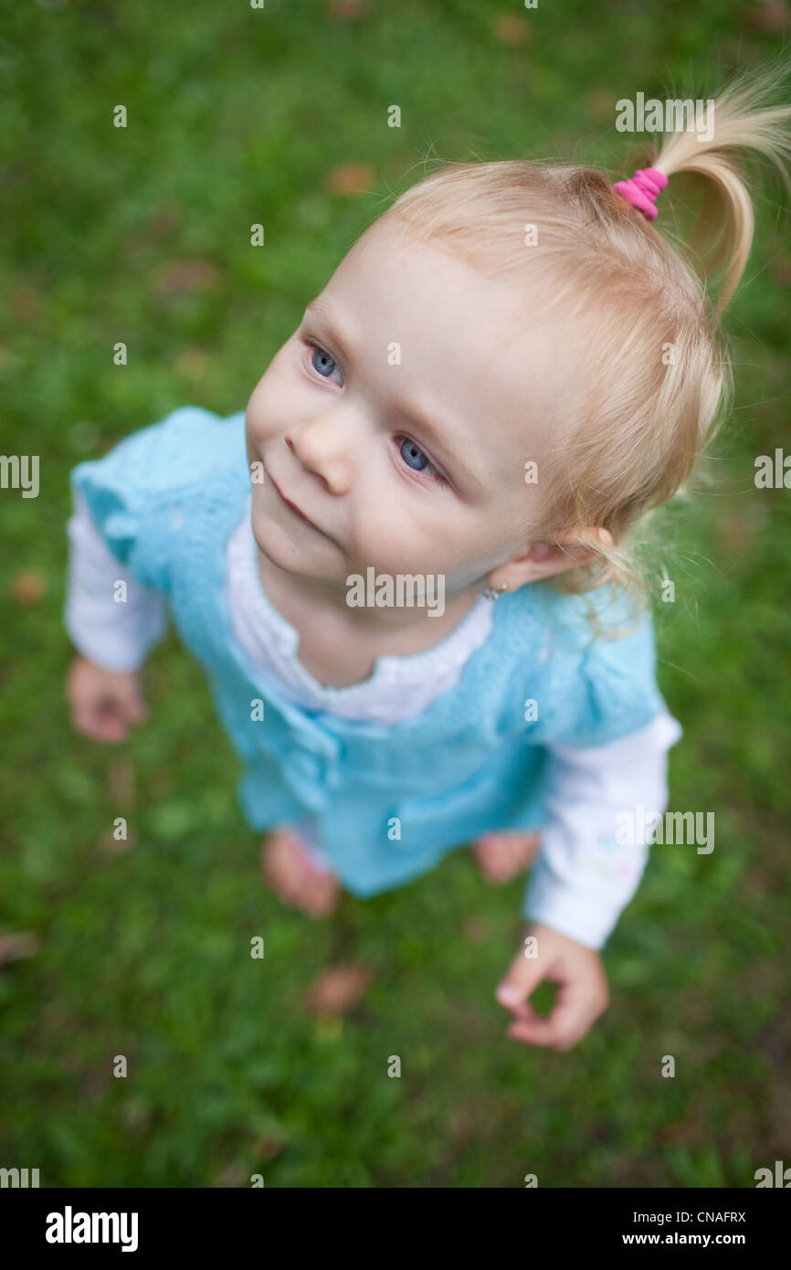 cute little girl outdoors in a park Stock Photo - Alamy