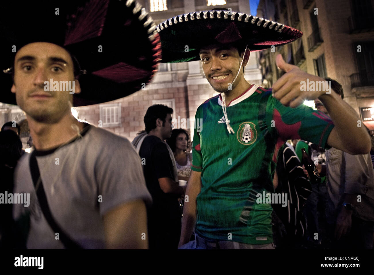 Mexican people, with the typical Mexican hat sombrero, celebrating the bicentennial of Mexican independence in Barcelona, Spain. Stock Photo