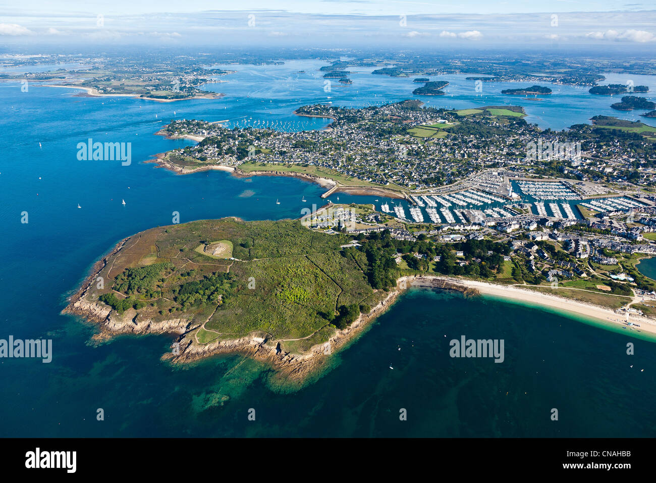 France, Morbihan, Golfe du Morbihan, Presqu'ile de Rhuys, Arzon, Petit Mont cairn and Le Crouesty marina (aerial view) Stock Photo