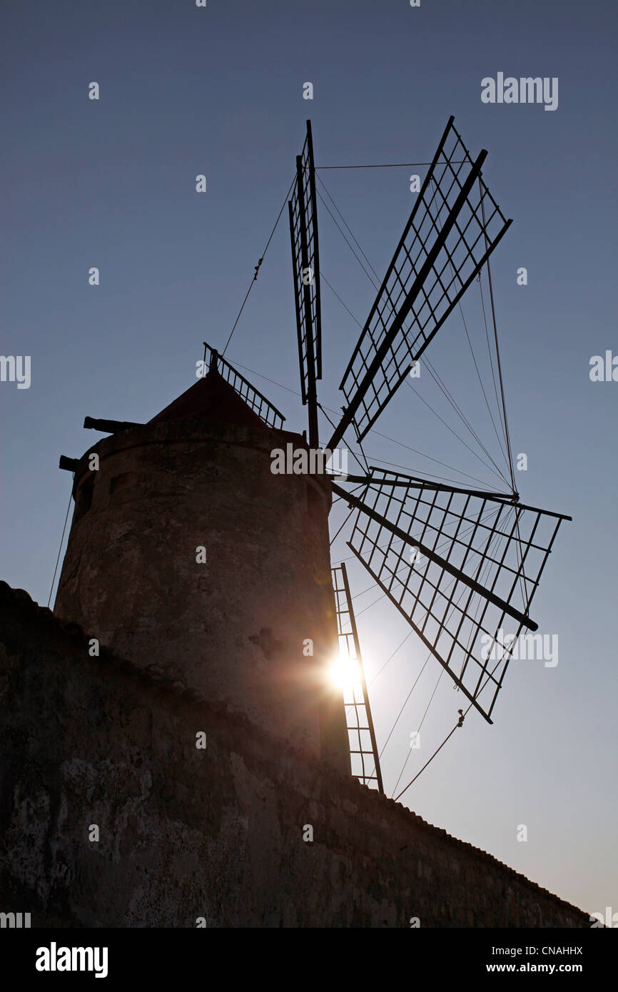 Windmill in the Salt Pans in Trapani, Sicily, Italy Stock Photo