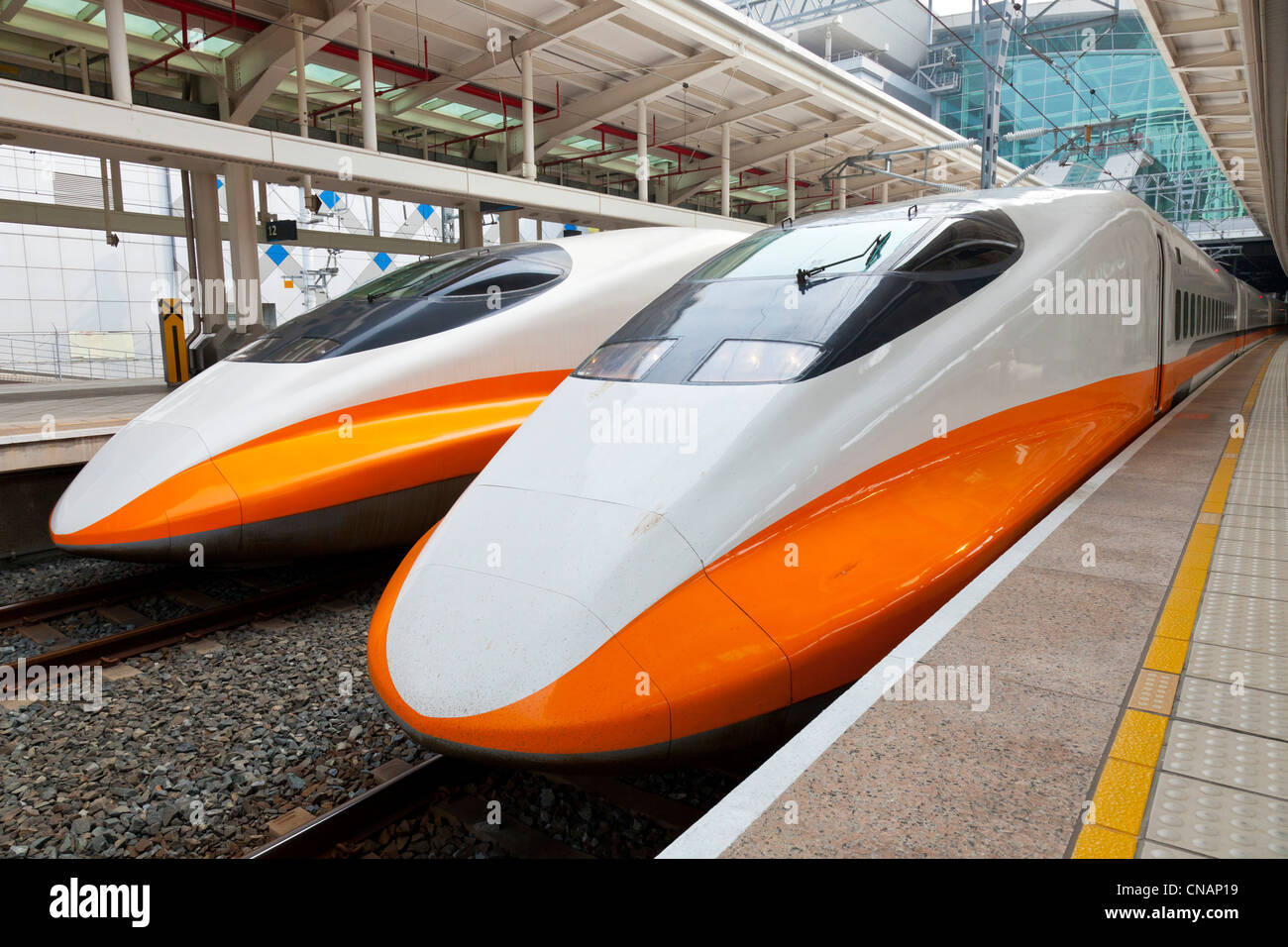 Two Taiwan High Speed Rail (THSR or HSR) trains at Zuoying near Kaohsiung, Taiwan. JMH5972 Stock Photo