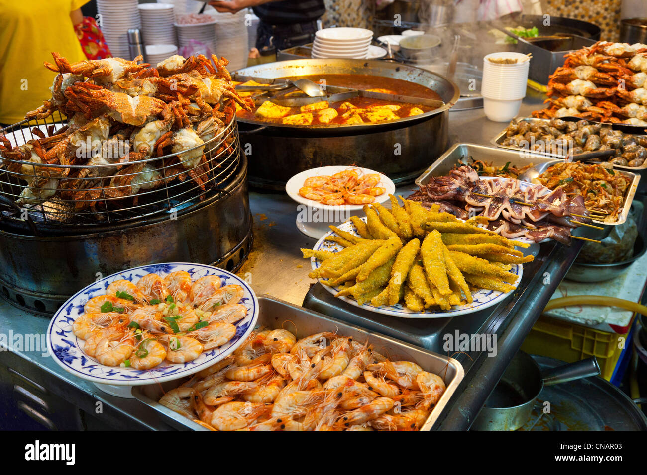 Seafood snacks stall in Shilin Night Market Taipei Taiwan. JMH5995 Stock Photo