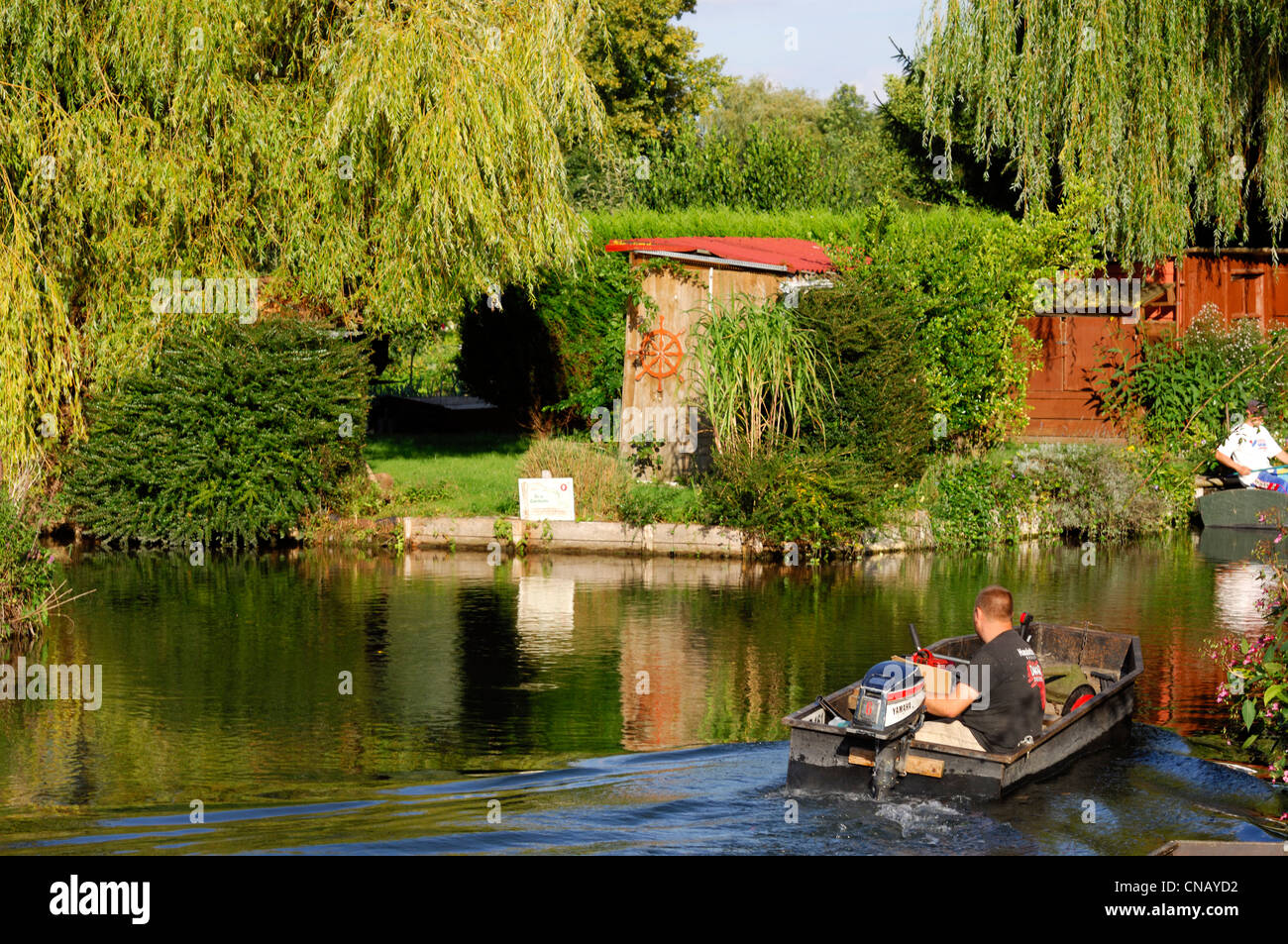 France, Somme, Amiens, motor boat in the middle of the Hortillonnages
