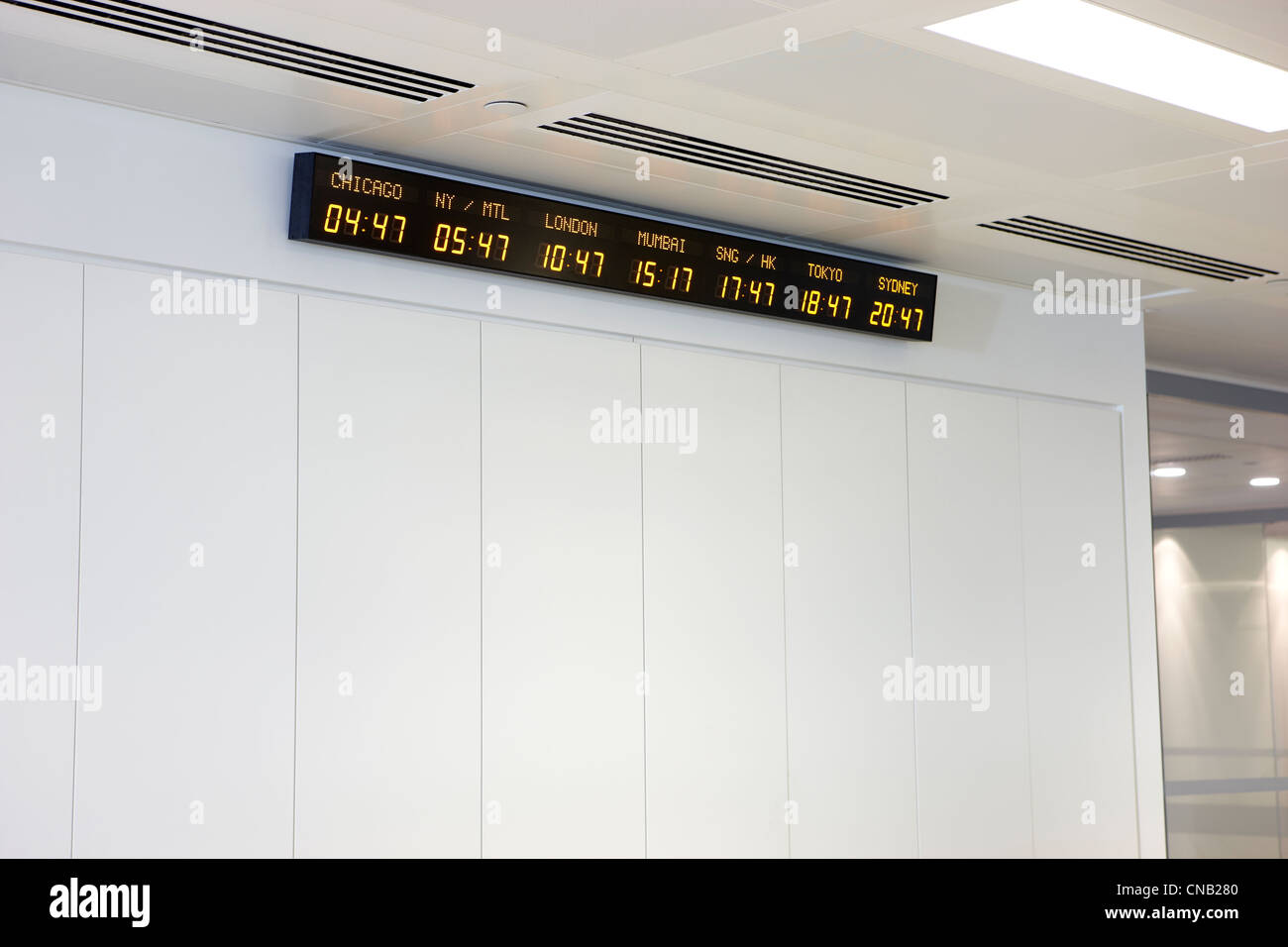 digital clocks time zones wall trading floor Stock Photo - Alamy