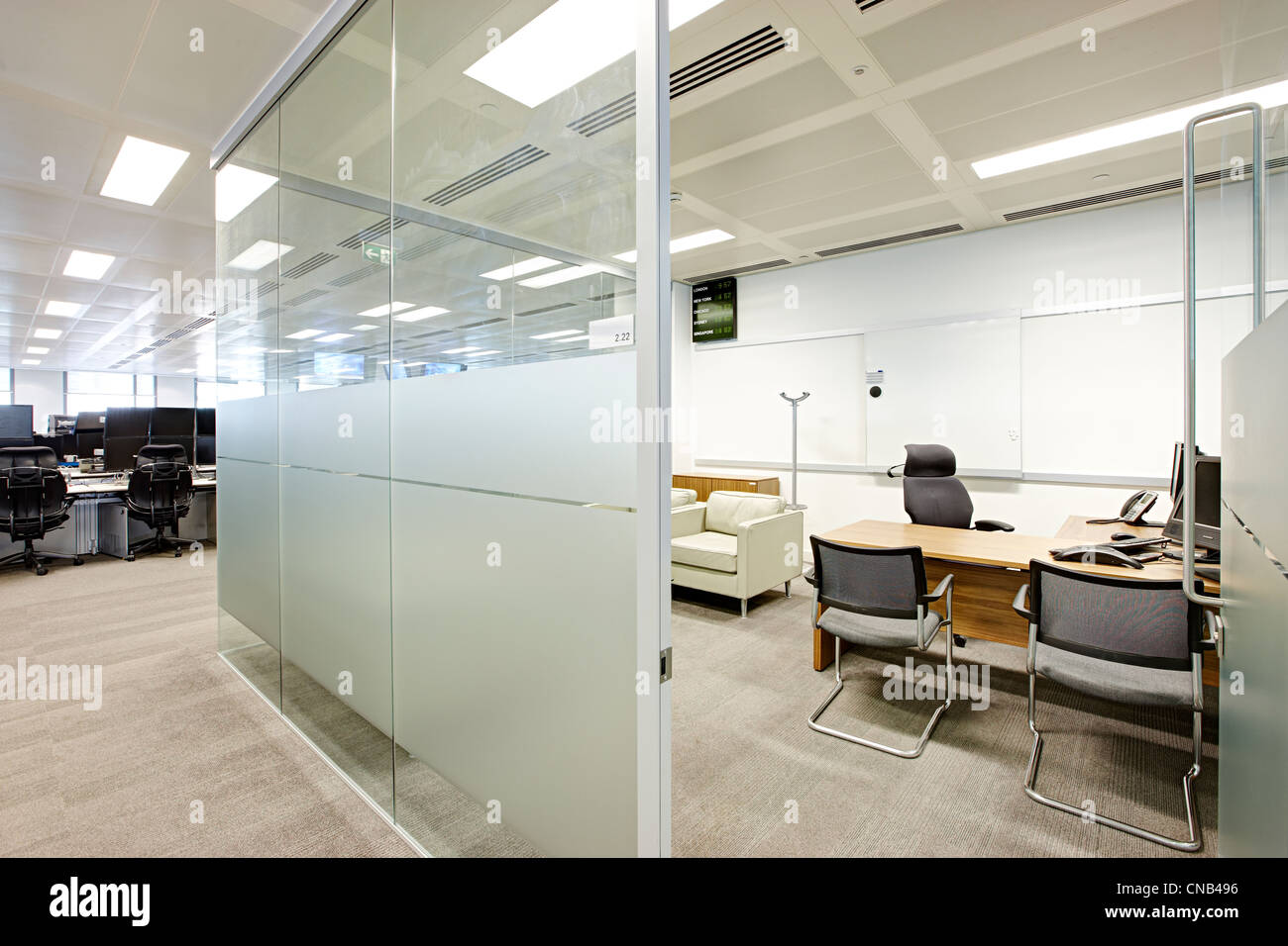 office trading floor supervisor glass wall meeting Stock Photo