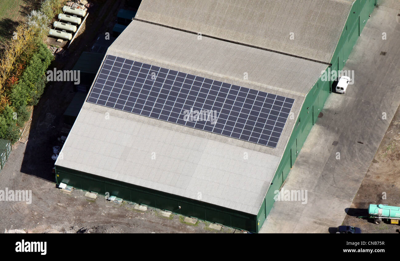 aerial view of solar panels on a farm building Stock Photo