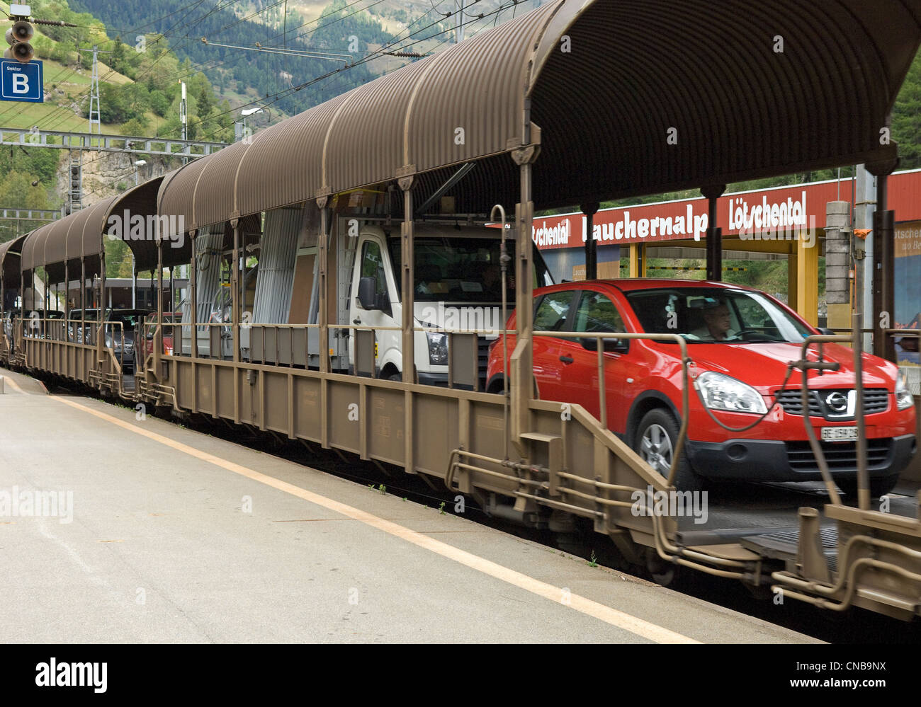 Car transport train in Goppenstein station in Canton of Car transport train in Goppenstein station in Canton of