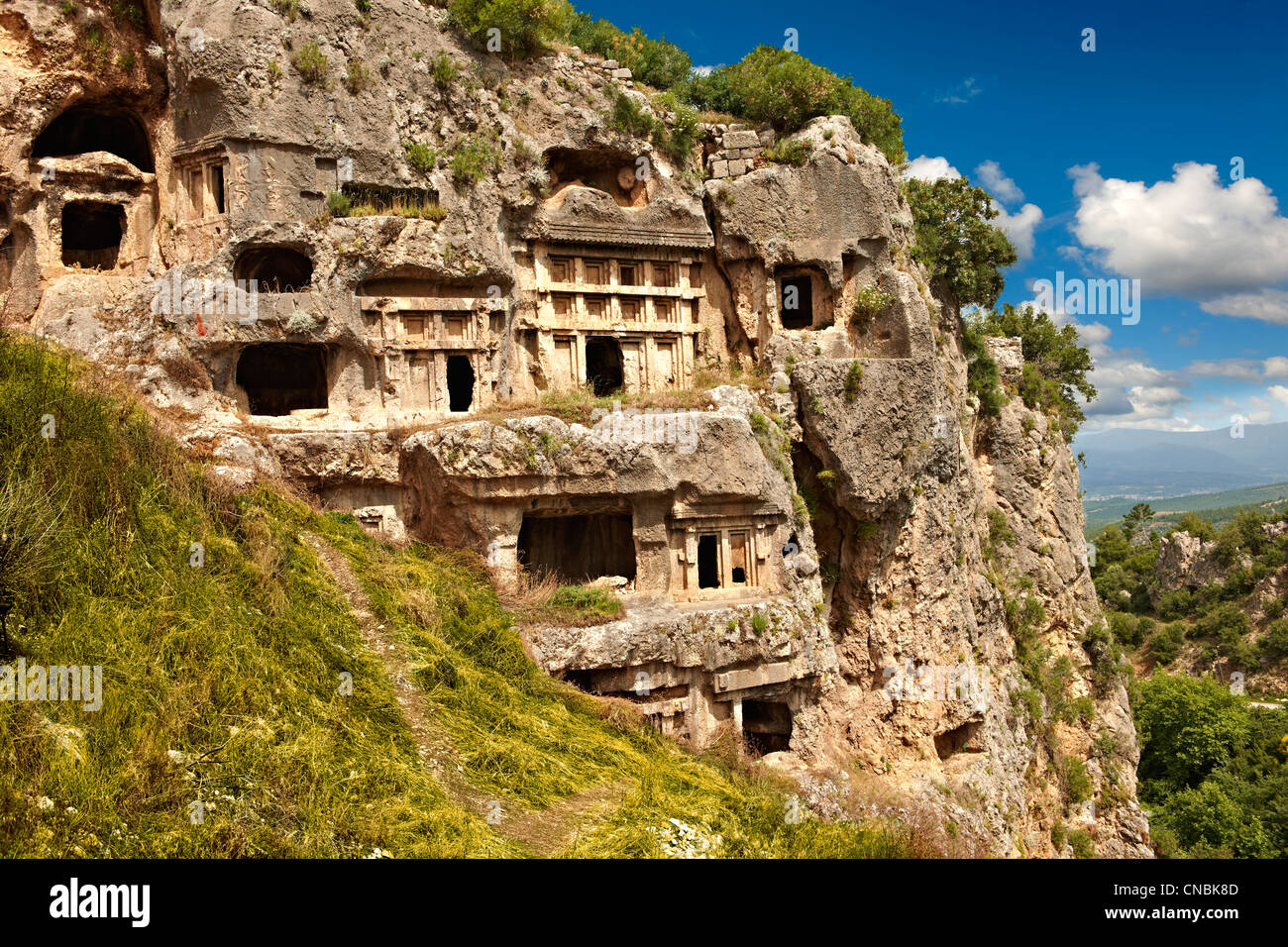 Tlos acropolis and Lycian house and temple-type rock-cut tombs. Anatolia Turkey Stock Photo