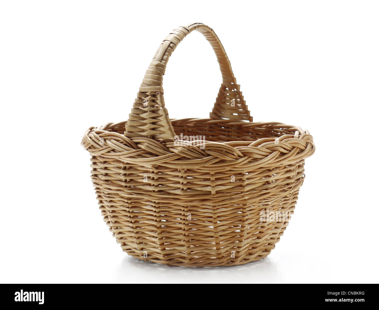 Empty wicker basket shot on white Stock Photo