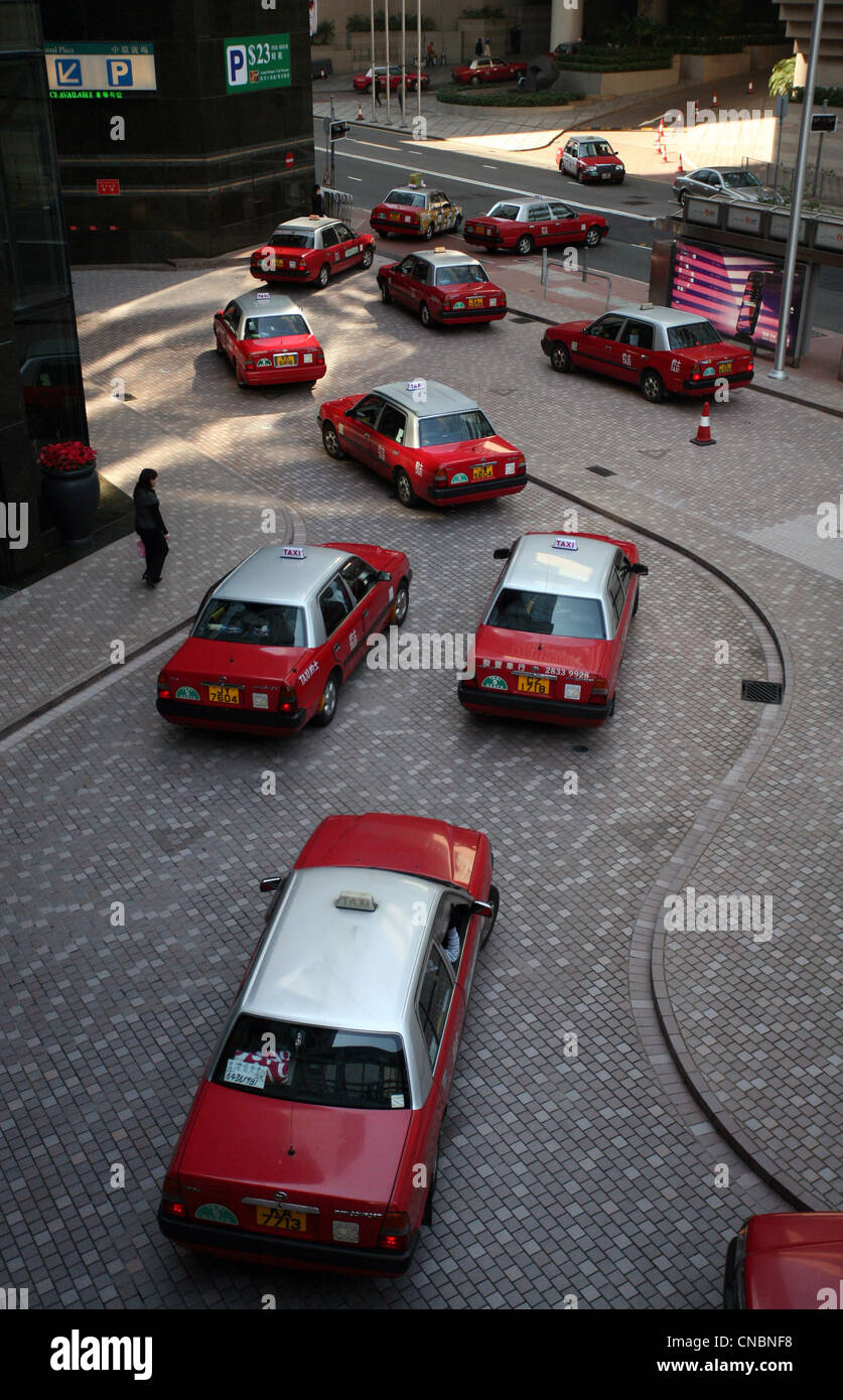 Taxis in a street, Hong Kong, China Stock Photo