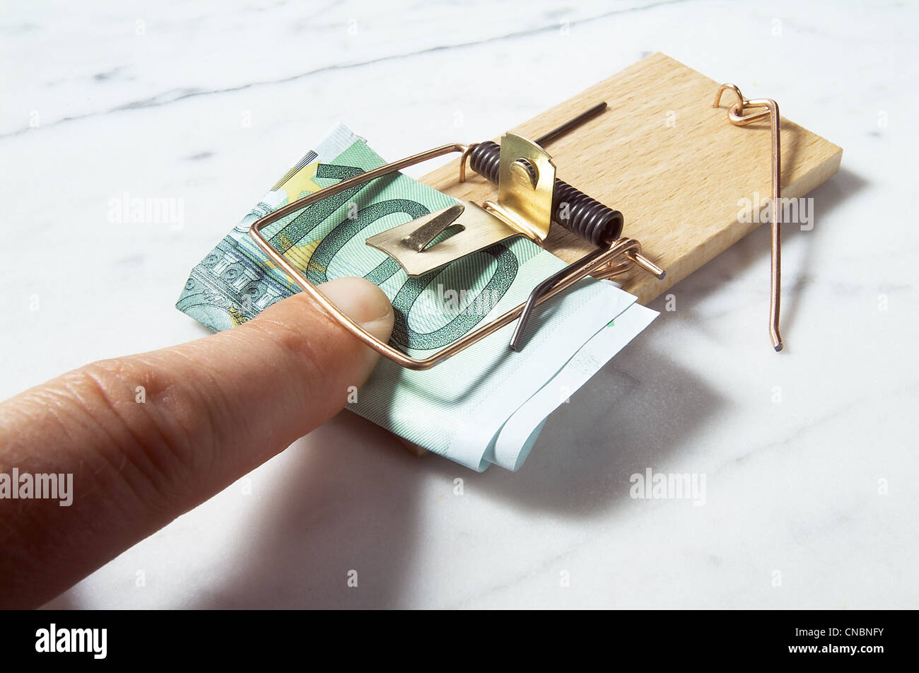 Symbolic picture of a cost trap Stock Photo