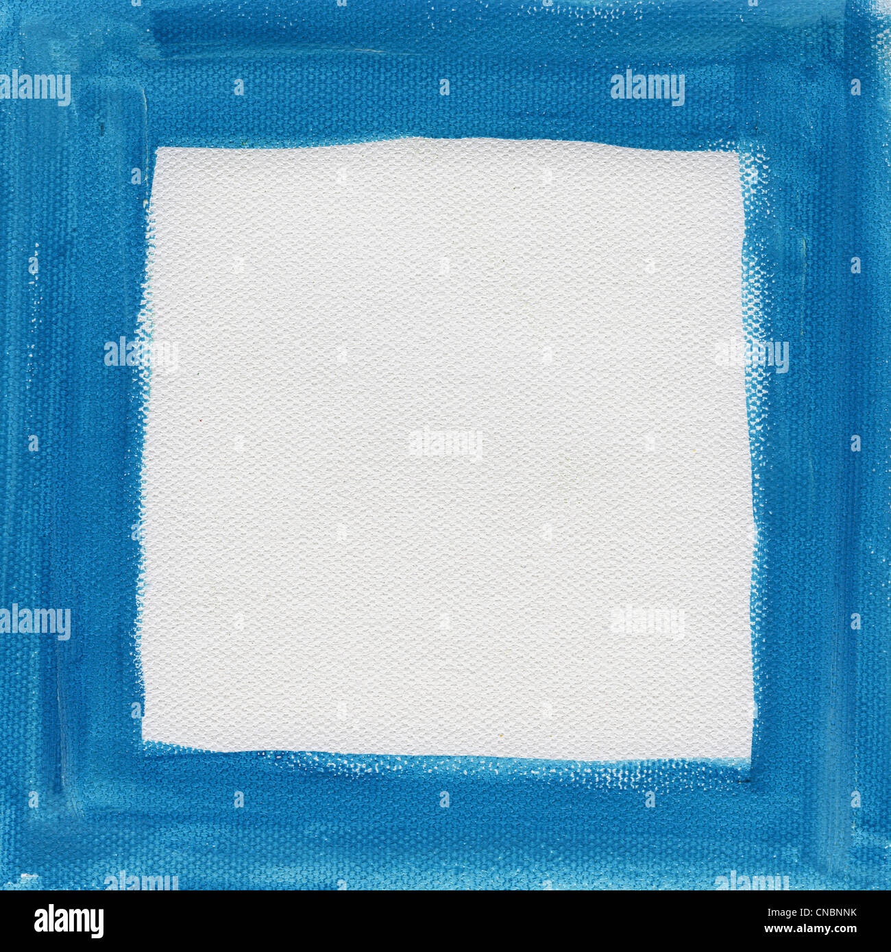 hand painted blue watercolor frame (border) surrounding white blank square on artist canvas Stock Photo