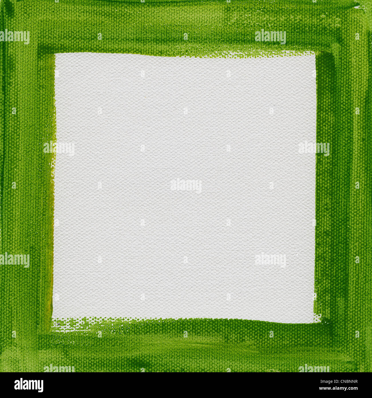 hand painted green watercolor frame (border) surrounding white blank square on artist canvas Stock Photo
