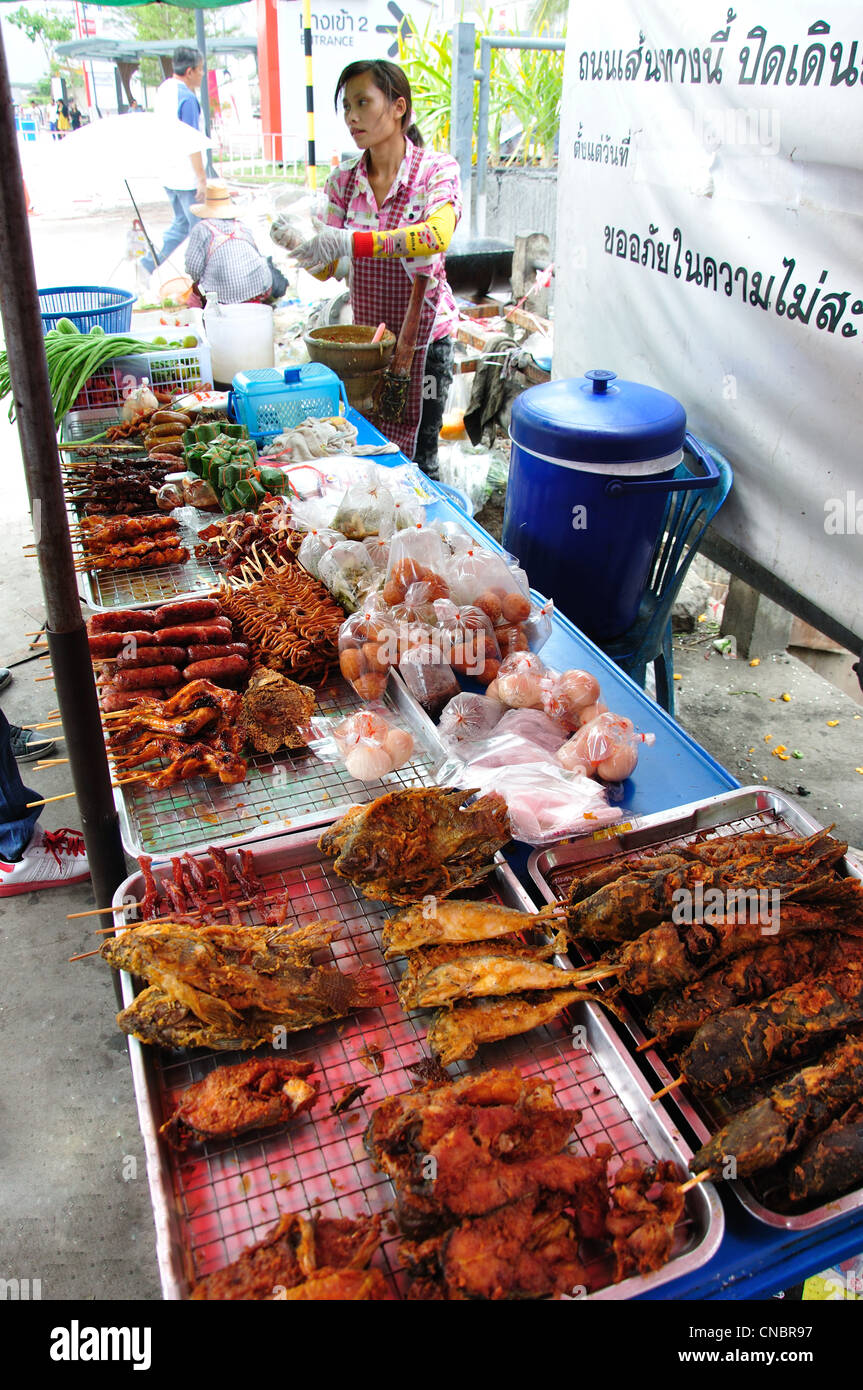 Cooked meat and fish skewers on street stall, Tikathananon Road, Udon Thani, Udon Thani Province, Thailand Stock Photo