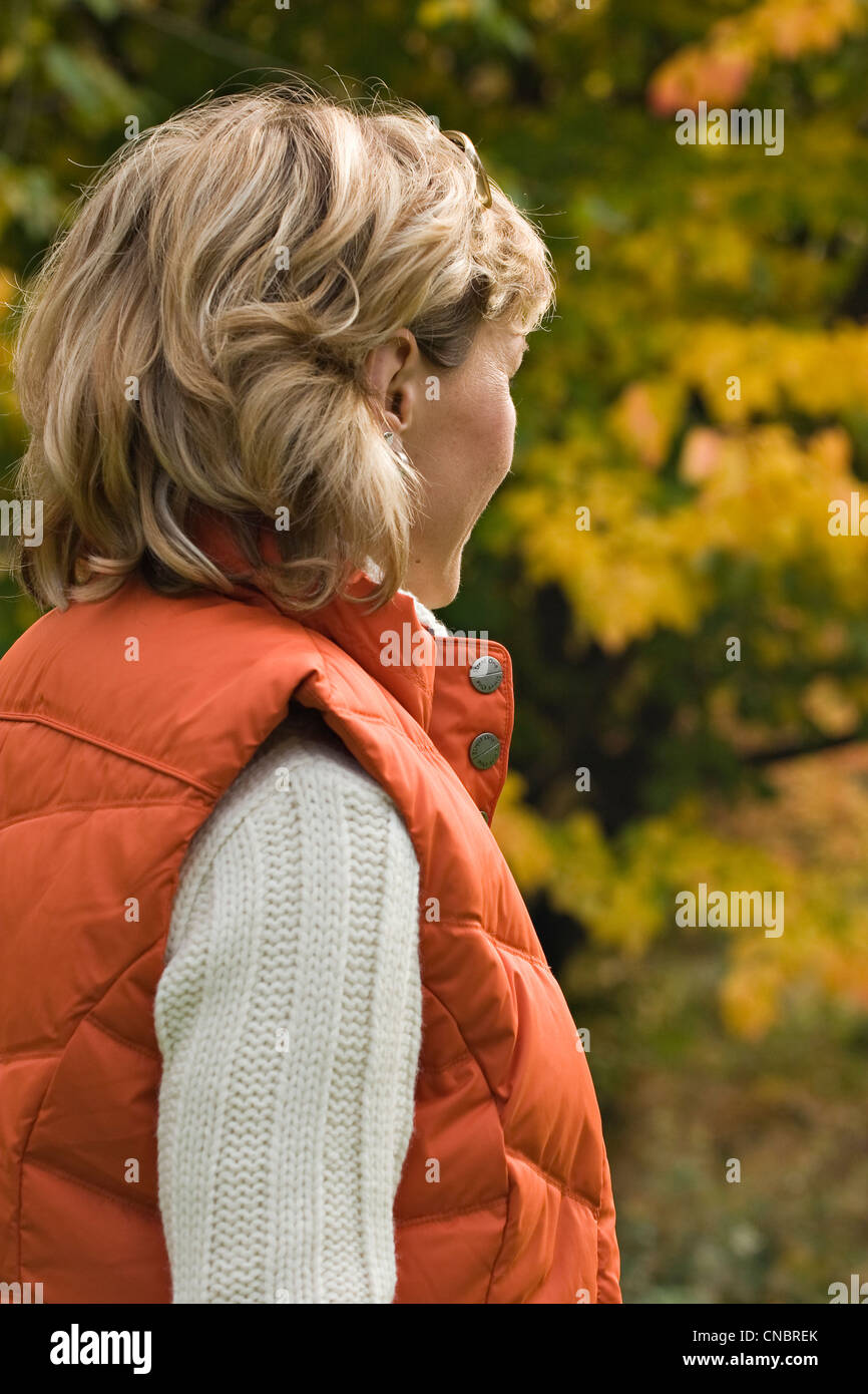 Woman in autumnal atmosphere Stock Photo