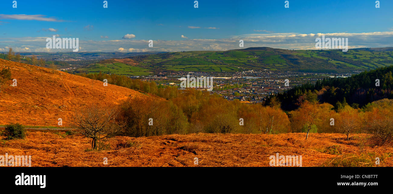 View of Caerphilly between a gap in the mountain Stock Photo Alamy