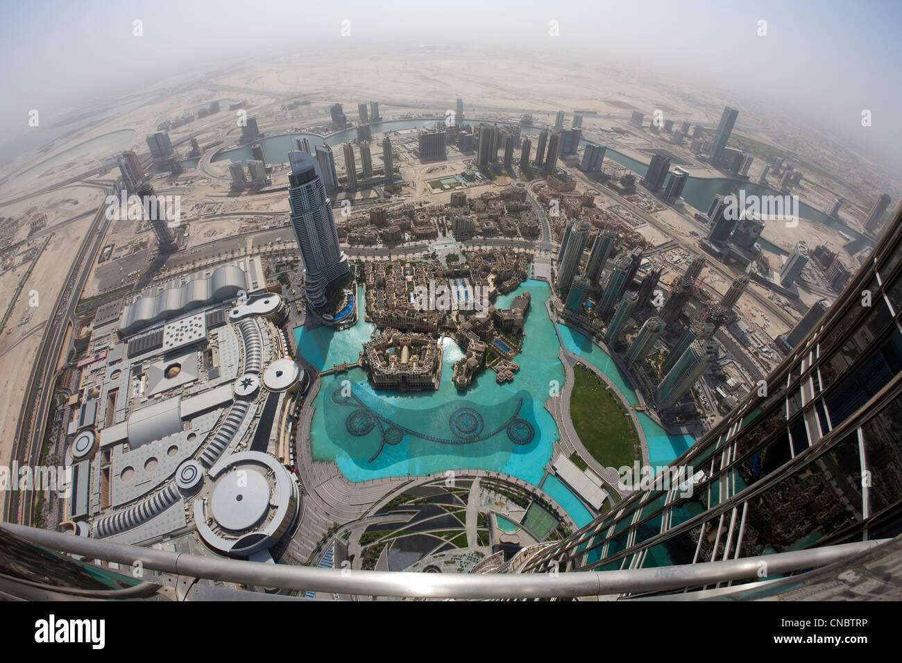 A view of Downtown Dubai area from the vantage point of the Buri Khalifa tower (Dubai - the United Arab Emirates). Stock Photo
