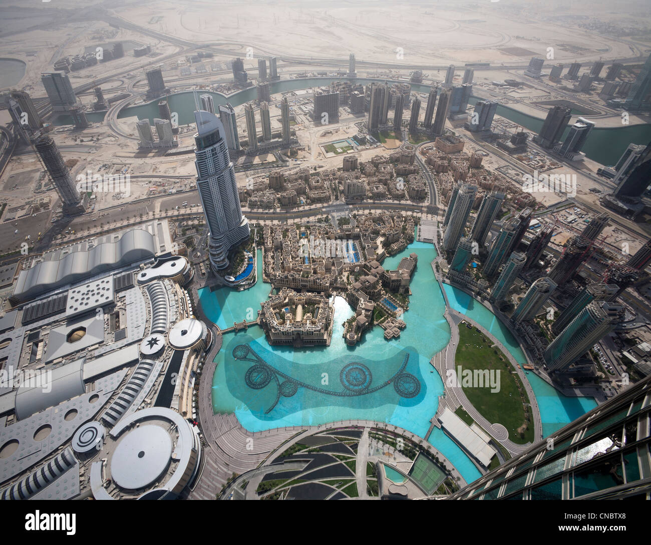 A view of Downtown Dubai area from the vantage point of the Buri Khalifa tower (Dubai - the United Arab Emirates). Stock Photo