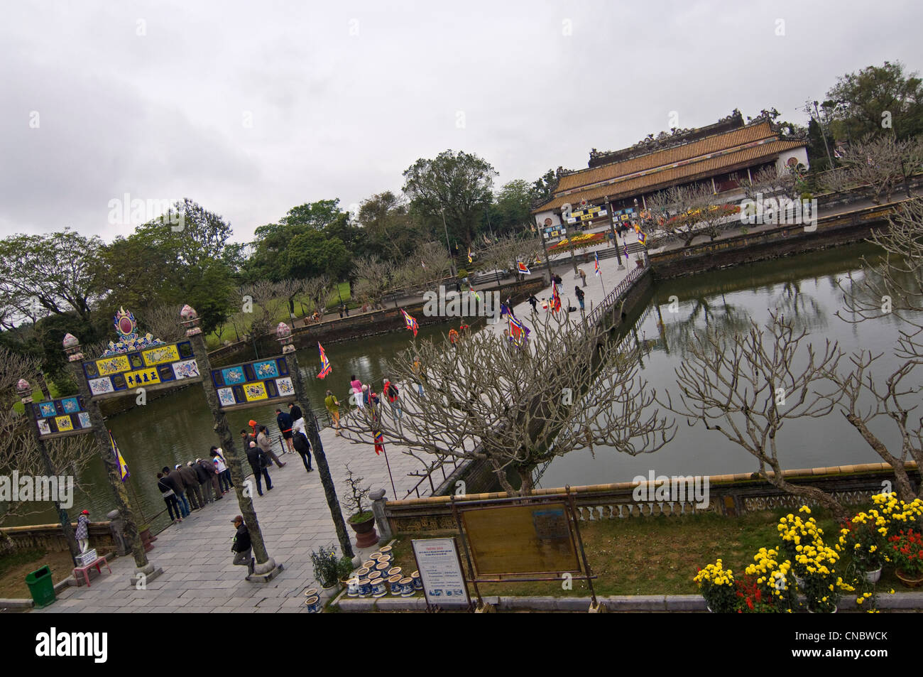 Horizontal elevated view of Trung Dao Bridge with Dien Thai Hoa (Palace of Supreme Harmony) at Royal or Imperial Citadel in Hue, Vietnam Stock Photo