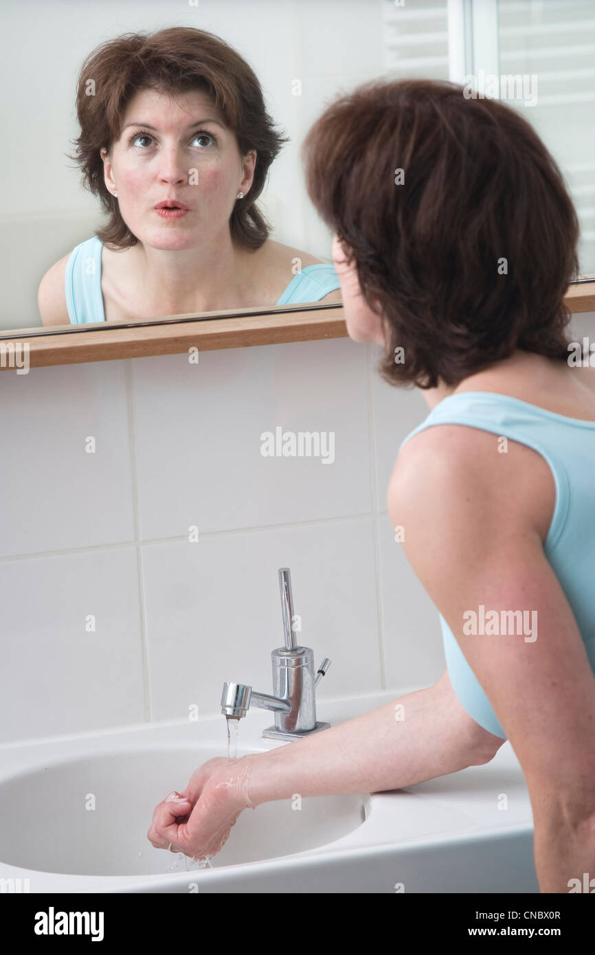 Wrists water tap hires stock photography and images Alamy