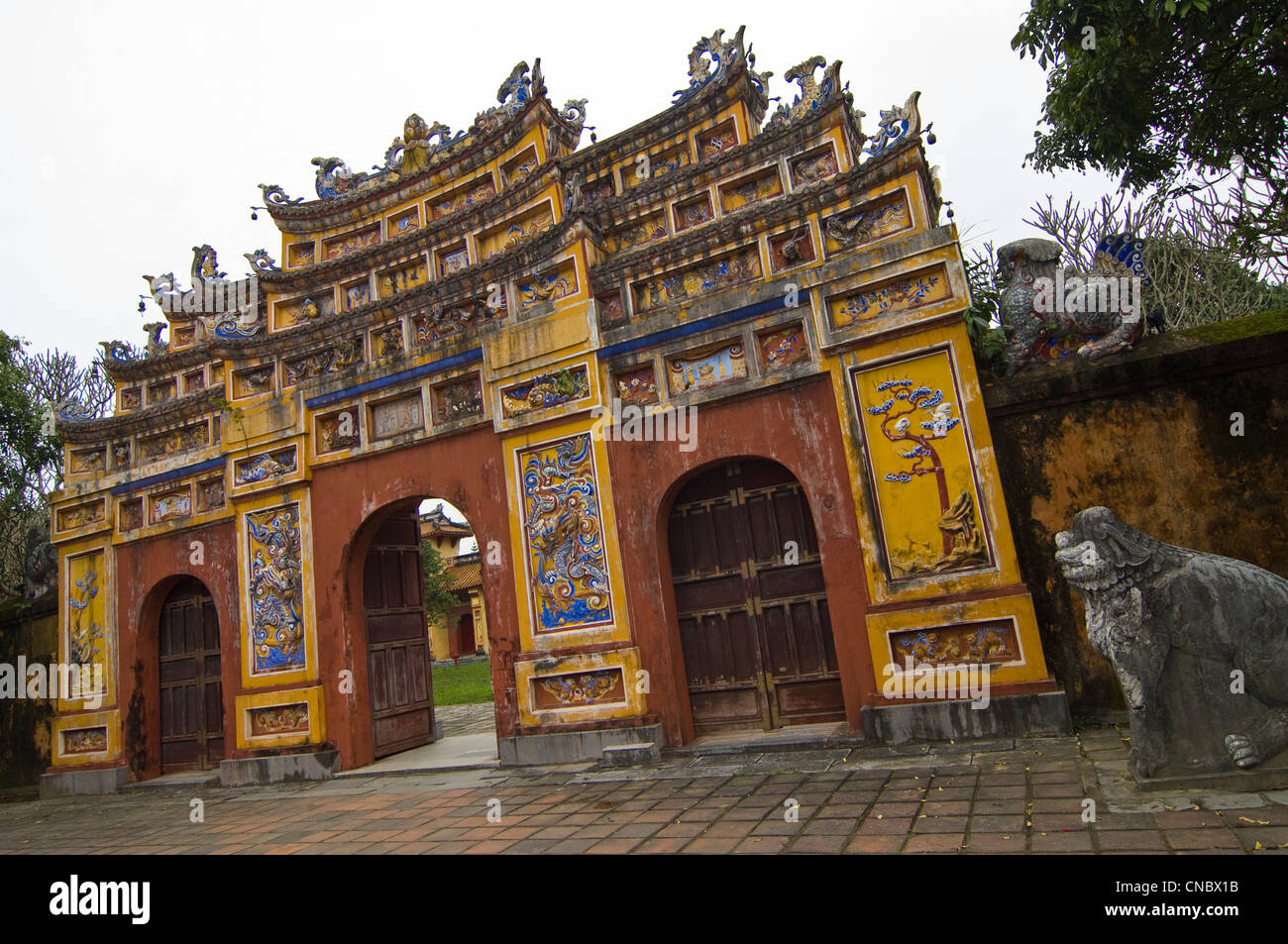 Horizontal view of Hien Lam Cac Pavilion, [Pavilion of Lasting Lucidity] an ornate gateway in the Imperial Citadel in Hue, Vietnam Stock Photo