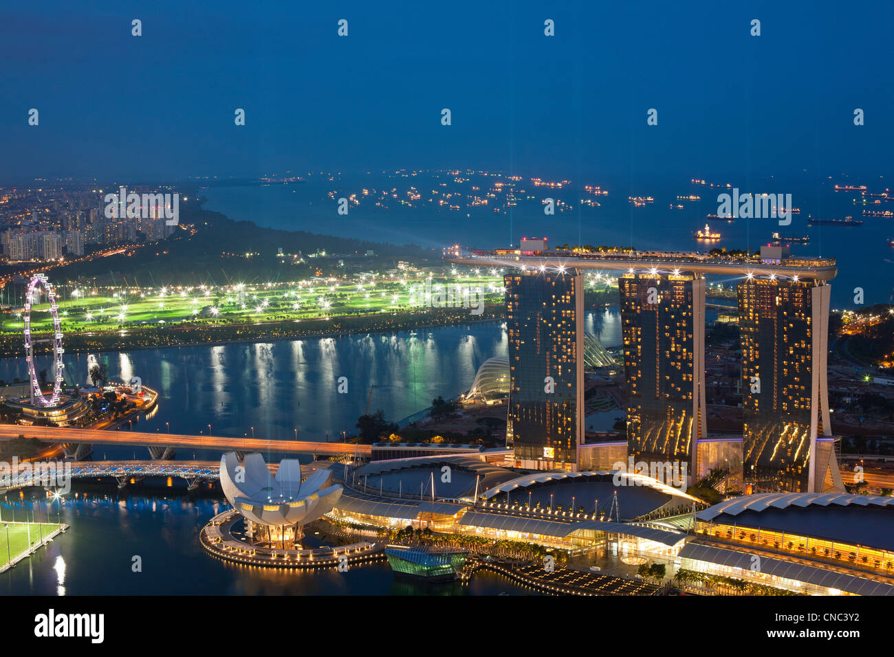 Singapore, Marina Bay, view from the 1-Altitude bar over the Marina Bay Sands Hotel, opened in 2010, and designed by architect Stock Photo