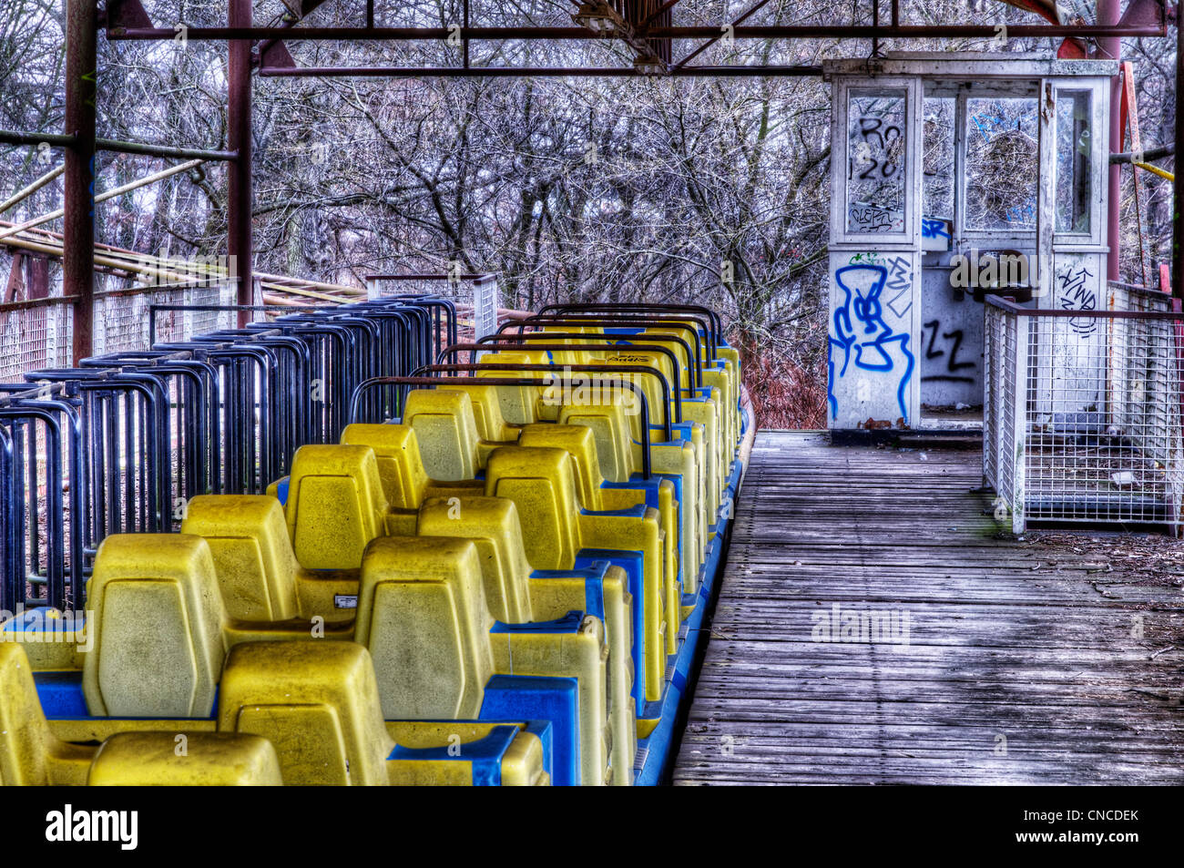 An abandoned roller coaster train in the funfair in Treptower Park (aka Spreepark) in ex East Berlin Stock Photo