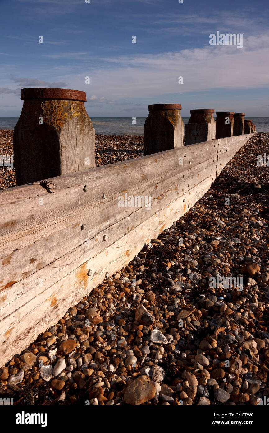 Erosion control, coastal defence groyne on shingle beach, Eastbourne, East Sussex, England, UK Stock Photo