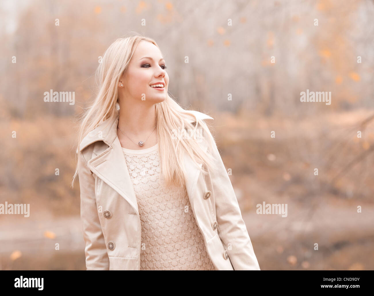 blond woman in the autumn park Stock Photo - Alamy