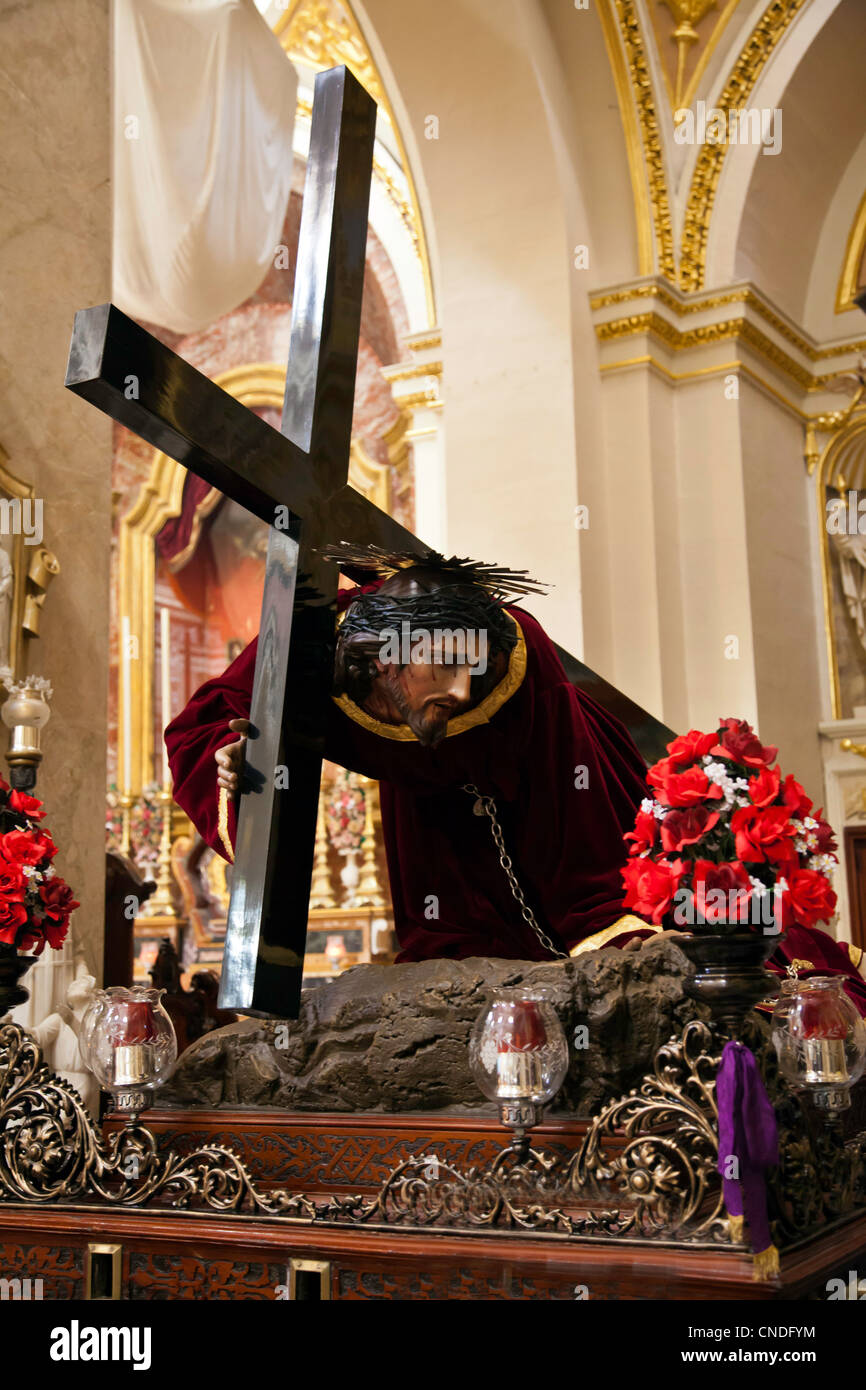 Jesus Christ carrying the cross Stock Photo