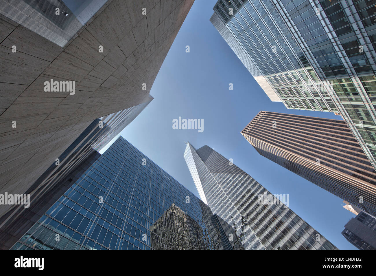Looking up at skyscrapers on Sixth Avenue in Manhattan, New York City Stock Photo