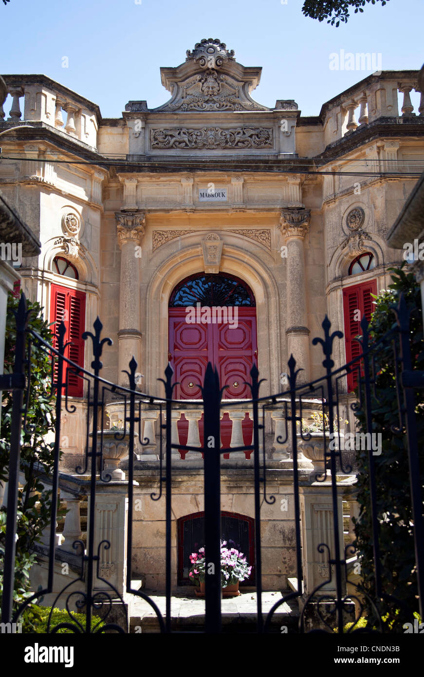 Villa with wrought iron gates Stock Photo Alamy