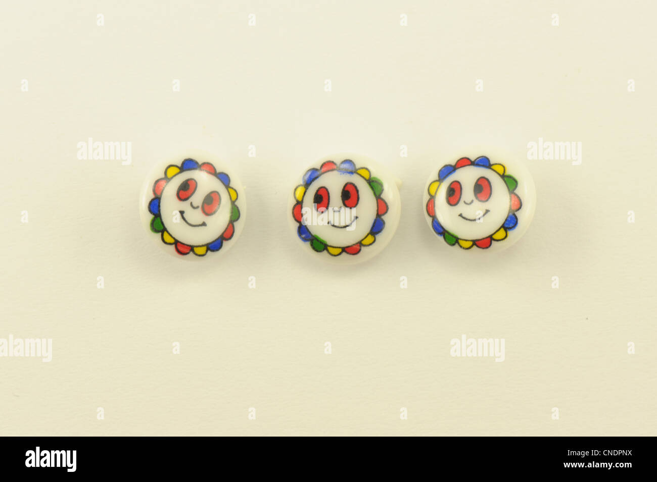 Buttons Childrens Smiley Face 3 Bright Multi Colored Taken On A White Background Stock Photo Alamy