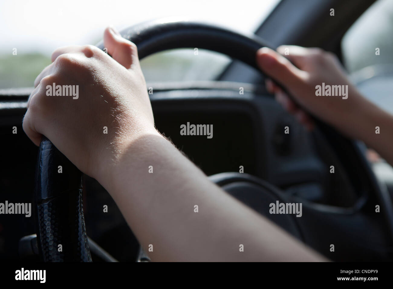 Hands on the steering wheel Stock Photo Alamy