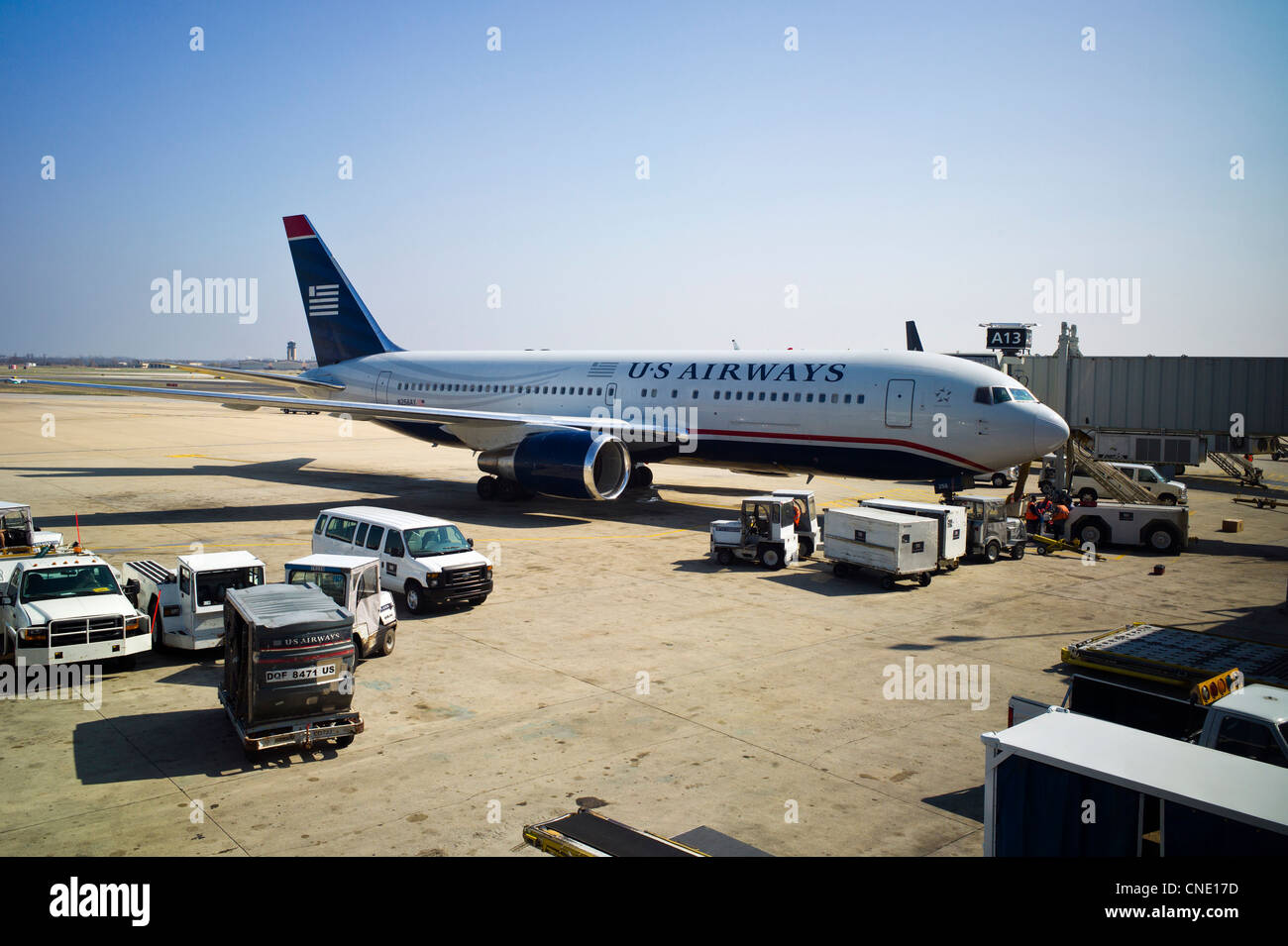 USAirways commercial jet parked at a gate at the Denver International Airport, Denver, Colorado, USA Stock Photo