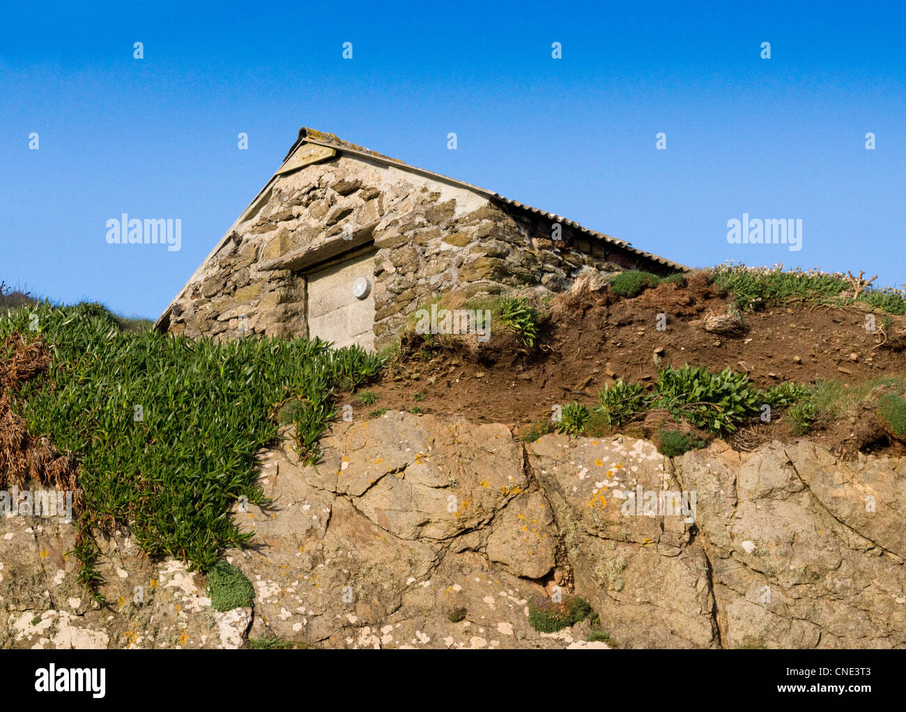 Stone Clifftop hut at Lizard Point Cornwall Stock Photo