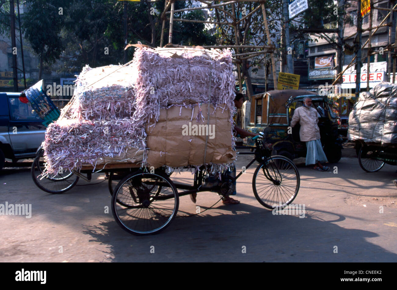 Street life dominated by Rickshaw Stock Photo