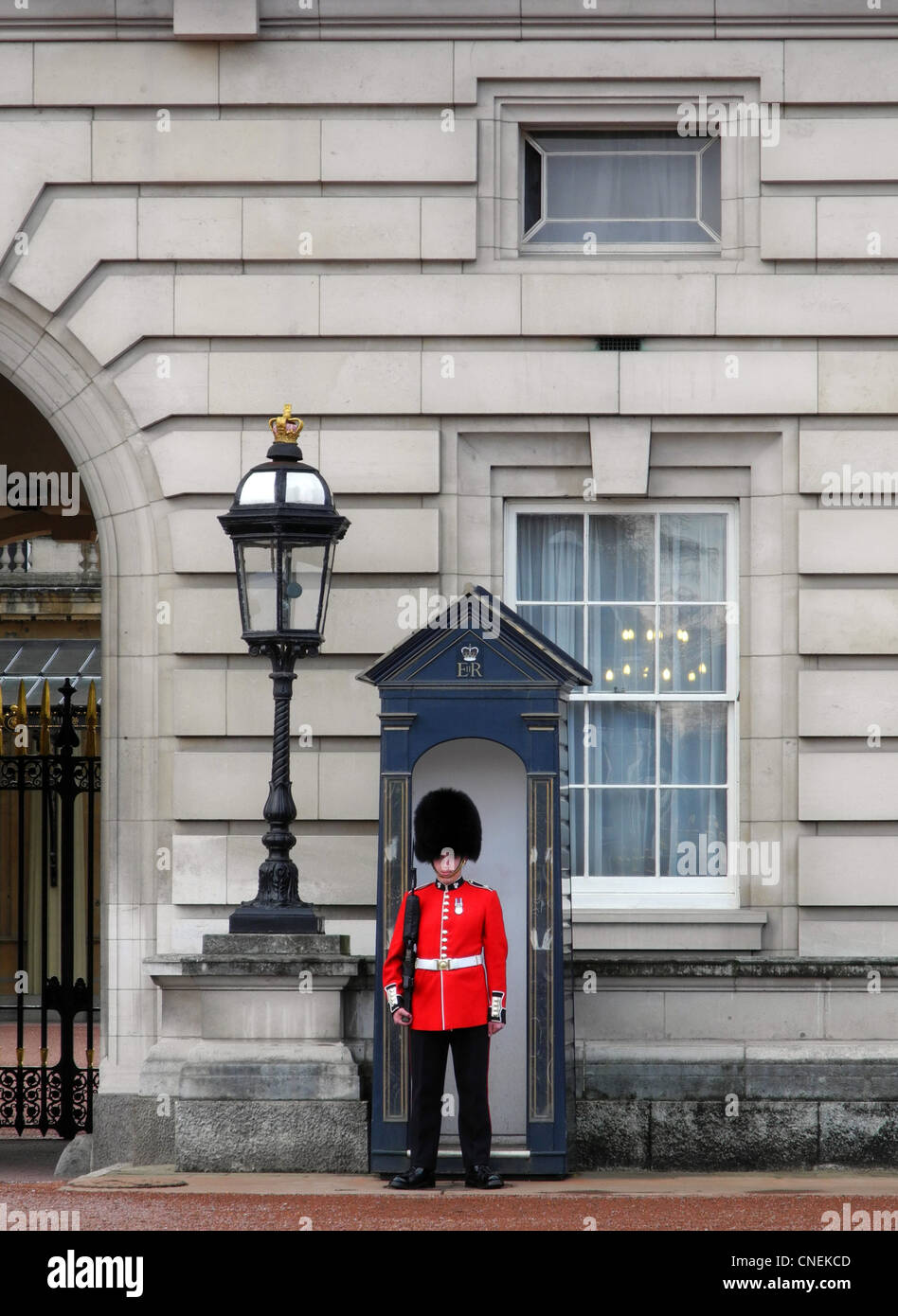 Guard outside Buckingham Palace in London Stock Photo