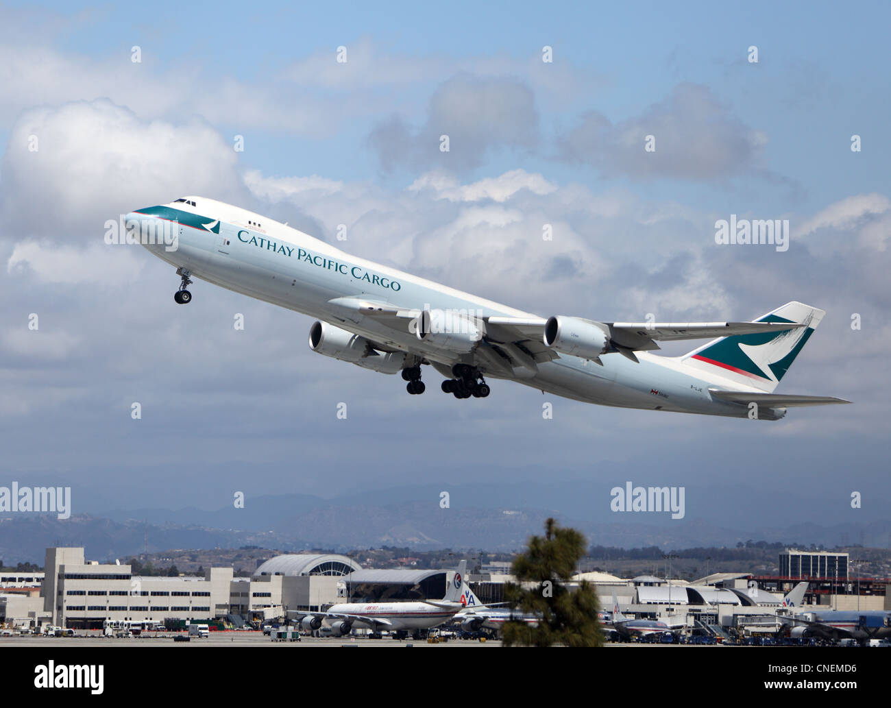 LOS ANGELES, CALIFORNIA, USA - APRIL 12, 2012 - Cathay Pacific B747-8 Freighter jet plane takes off at Los Angeles Airport. Stock Photo