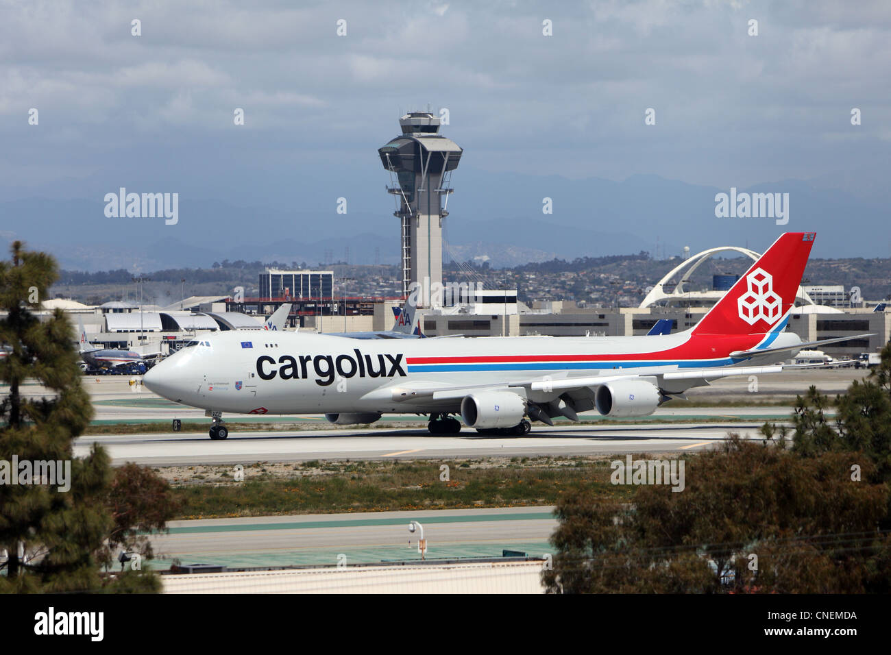 LOS ANGELES, CALIFORNIA, USA - APRIL 12, 2012 - Cargolux B747-8 Freighter jet plane taxis to the cargo terminal at Los Angeles. Stock Photo