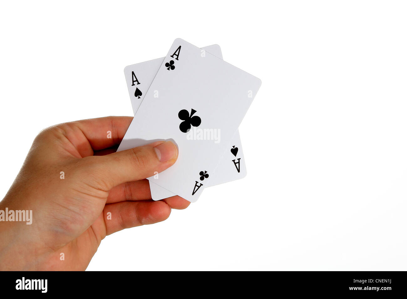 Ace of Spades and Ace of Clubs held in hand Stock Photo Alamy