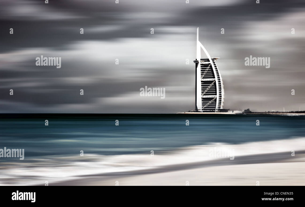 Dark storm, windy landscape of Dubai beach, beautiful nature, seascape with blur motion, Hotel on the sea shore Stock Photo