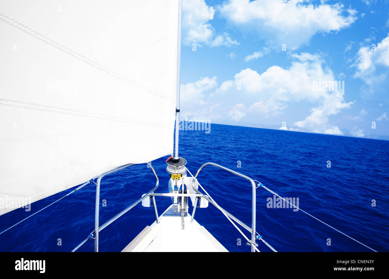 White sailboat at open blue sea, luxury boat parts, extreme sport, freedom concept Stock Photo