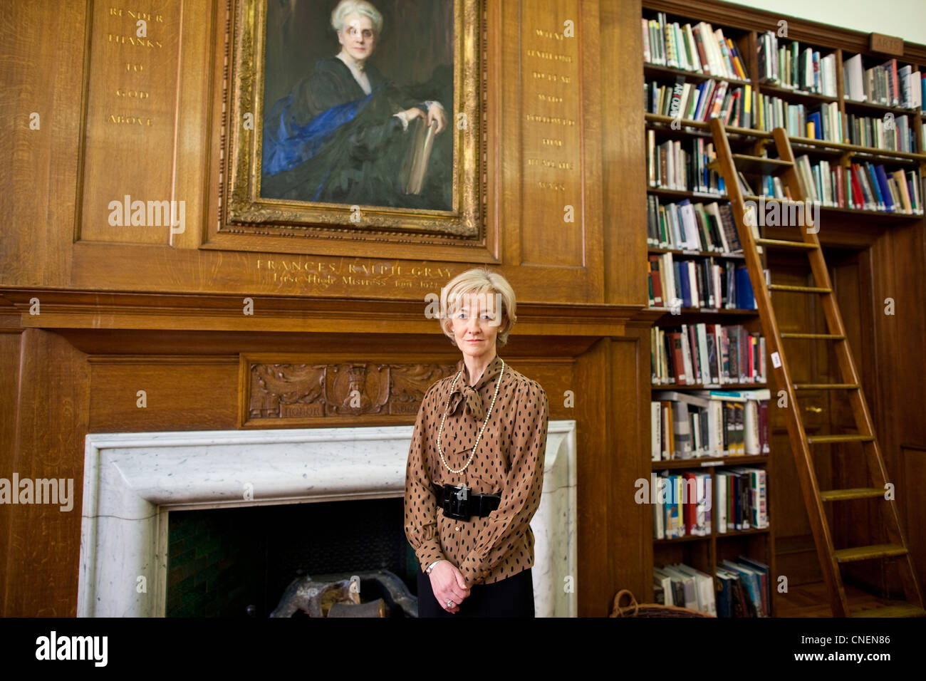 High Mistress, Clarissa Farr in the library of St Paul's Girls' School in Hammersmith, London, England, UK Stock Photo