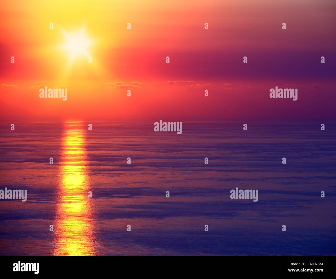 Beautiful seascape with warm sunset Stock Photo - Alamy