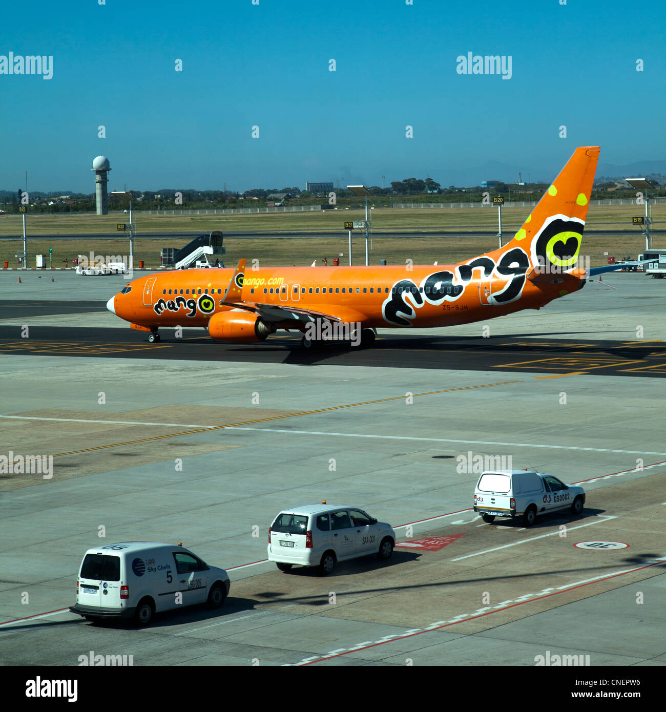 Mango Plane on Runway at Cape Town International Airport Stock Photo
