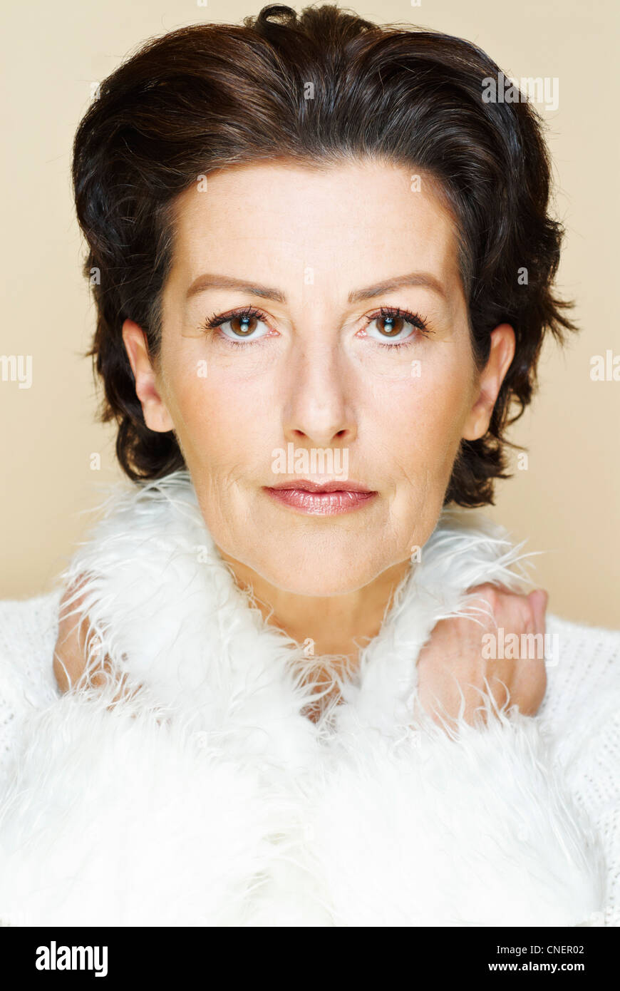 portrait of elegant dark-haired woman in her forties Stock Photo