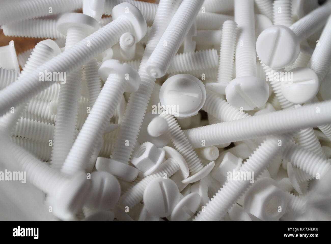 Plastic nuts and bolts Stock Photo Alamy