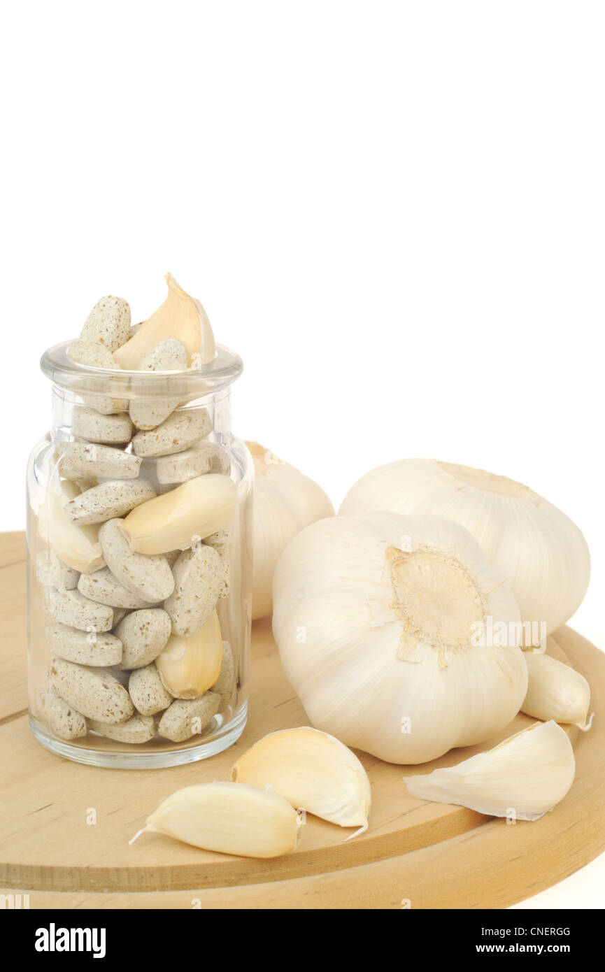 Garlic and herbal supplement pills isolated, alternative medicine