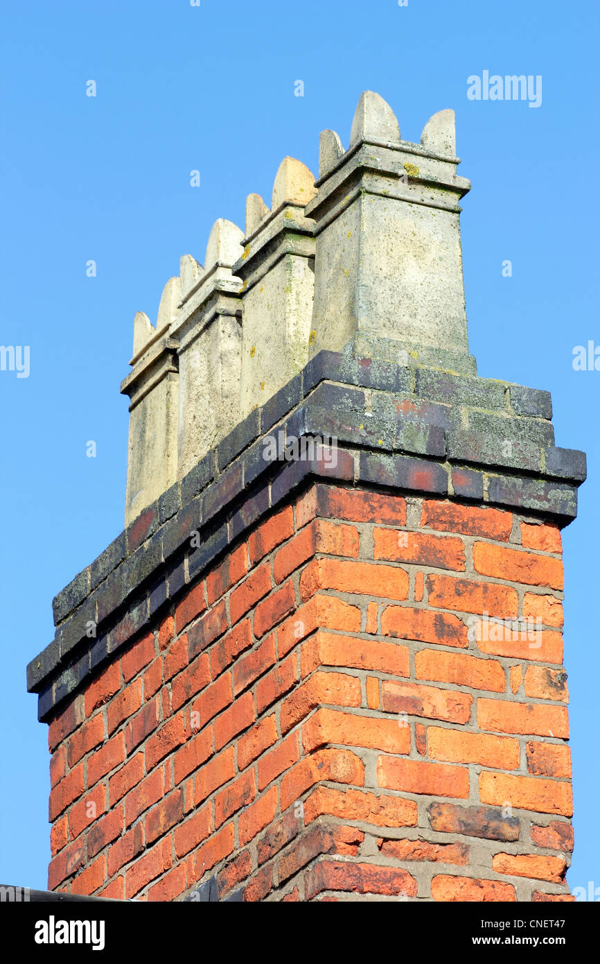 A row of chimney pots on a Victorian terraced house Stock Photo Alamy